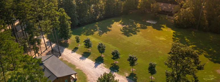 Aerial photo of Camp Kanata campus showing cabin and fields