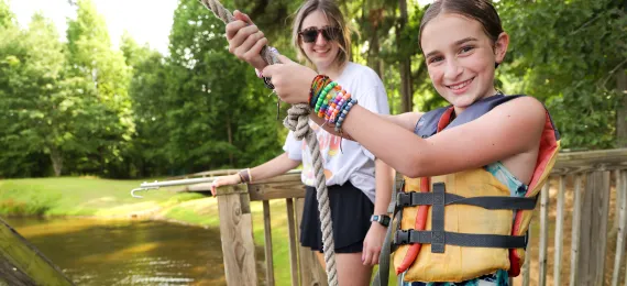 Rope swing at the Camp Kanata lake